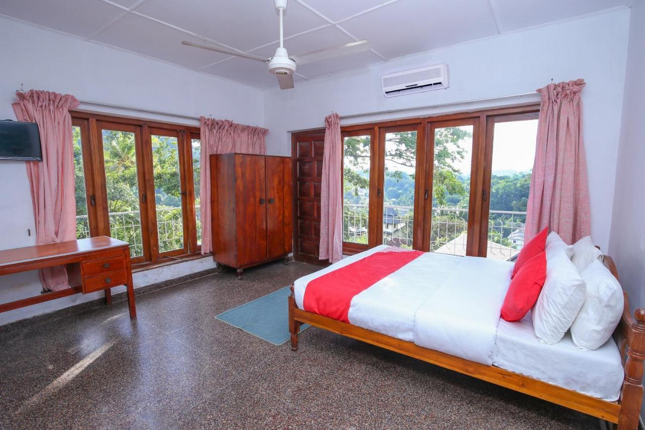 Oyo 436 Sandakelum Tourist Guest House Канди Экстерьер фото
